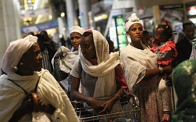 Ethiopian immigrants arrive at Ben-Gurion Airport in December 2011. (photo credit: Kobi Gideon/Flash90)