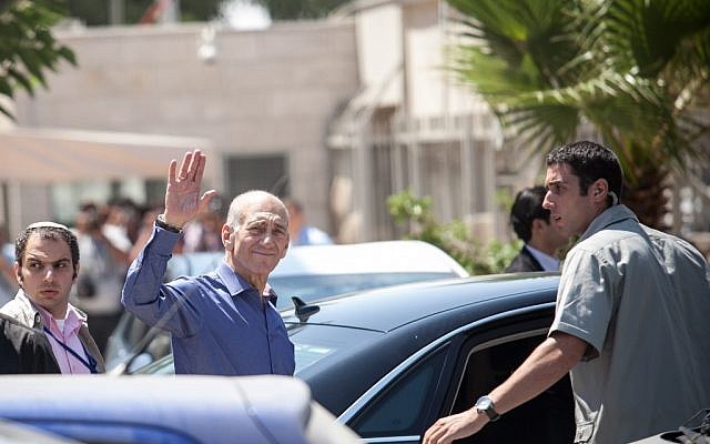 Ehud Olmert leaving court on Tuesday. (photo credit: Noam Moskowitz/Flash90)