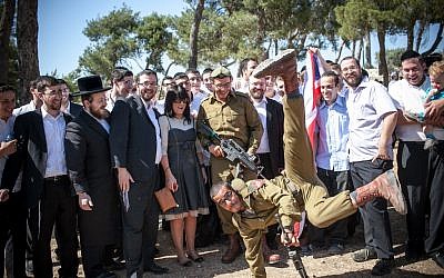 Religious Jewish soldiers attend a swearing-in ceremony as they enter the haredi IDF 'Netzah Yehuda' unit (photo credit: Noam Moskowitz/Flash90)