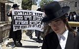 Ultra-Orthodox men in Jerusalem protest intention to draft them in July 2012 (photo credit: Yonatan Sindel/Flash90)