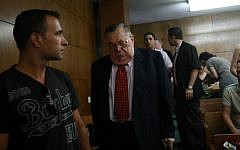 The state witness makes his way to the stand at the Tel Aviv District Court on Monday, July 2 2012 (photo credit: Yariv Katz/Pool/Flash90)
