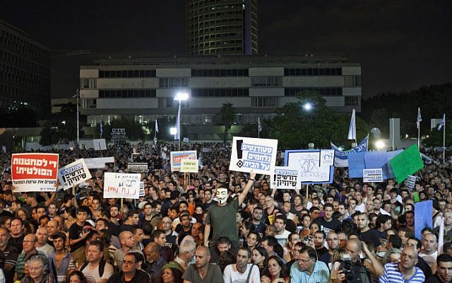 Tens of thousands of people hold a mass rally in Tel Aviv last month, urging the government to enact universal draft legislation (photo credit: Tali Mayer/Flash90) Tens of thousands of people hold a mass rally in Tel Aviv last month, urging the government to enact universal draft legislation (photo credit: Tali Mayer/Flash90)