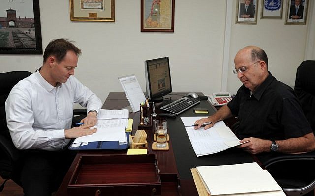 Vice Prime Minister Moshe Ya'alon (r) and MK Yohanan Plesner in Ya'alon's Jerusalem office on July 8 (photo credit: Moshe Milner/GPO/Flash90)