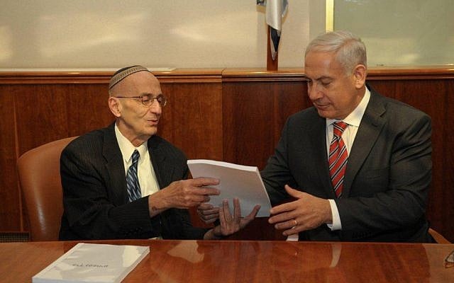 Edmond Levy (left) giving his committee's report to Benjamin Netanyahu last month. (photo credit: Flash90)
