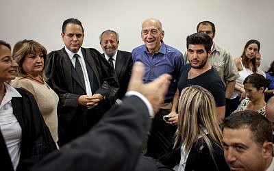 Former prime minister Ehud Olmert upon hearing the judges' decision in court in July (photo credit: Emil Salman/Flash90)
