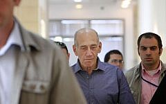 Olmert entering a court room. (photo credit: Miriam Alster/Flash90)