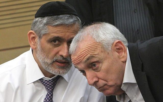 Interior Minister Eli Yishai (L) and Minister of Internal Security Yitzhak Aharonovich attend a Knesset committee meeting on the Carmel forest fire on Tuesday, July 17 (photo credit: Miriam Alster/ Flash90)