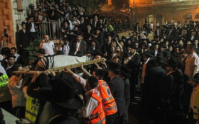 Throngs of ultra-Orthodox Jews attend the funeral of Rabbi Yosef Shalom Elyashiv in Jerusalem on Wednesday night, July 18, 2012. (photo credit: Uri Lenz/Flash90) Throngs of ultra-Orthodox Jews attend the funeral of Rabbi Yosef Shalom Elyashiv in Jerusalem on Wednesday night, July 18, 2012. (photo credit: Uri Lenz/Flash90)