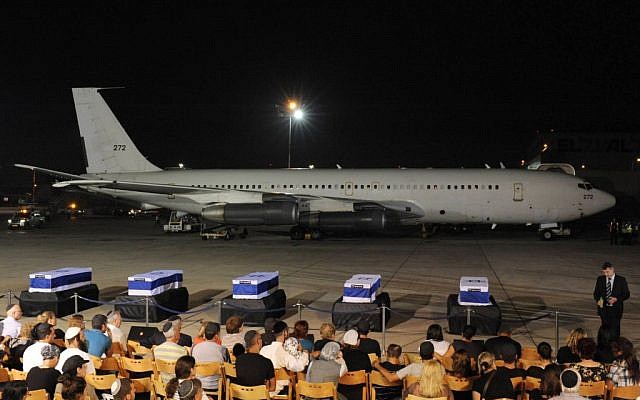 The coffins of the five victims of the Burgas bombing arrive at Ben Gurion airport (photo credit: Amos Ben Gershom/GPO/Flash90)
