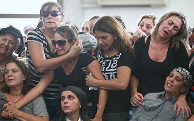 Friends and family mourn at the funeral of Itzik Kolengi, 27, at Petah Tikva’s Segula cemetery on Friday. (photo credit: Yehoshua Yosef/Flash90) Friends and family mourn at the funeral of Itzik Kolengi, 27, at Petah Tikva’s Segula cemetery on Friday. (photo credit: Yehoshua Yosef/Flash90)
