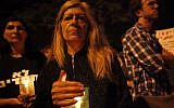 An Israeli woman holds a candle at a memorial march for Moshe Silman (photo credit: Miriam Alster/FLASH90)