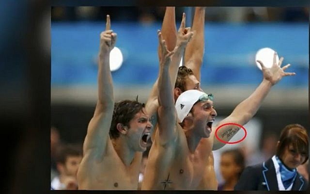 Fabien Gilot (right) after team France won the 4X100 relay race at London 2012 (photo credit: screen capture Liya28a/Youtube)