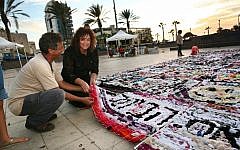 Working on the world's largest sock mosaic (photo credit: Courtesy)