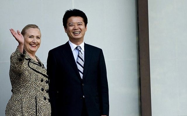 US Secretary of State Hillary Rodham Clinton, left, and Japanese Foreign Minister Koichiro Gemba stand before a meeting in Tokyo on Sunday, July 8 (photo credit: AP/Brendan Smialowski)