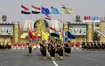 An Egyptian military honor guard stands in formation at a graduation ceremony attended by President Mohammed Morsi and other political and military dignitaries at a military base east of Cairo on Monday, July 9, 2012. (Mohamed Smaha, Egyptian Presidency/AP)