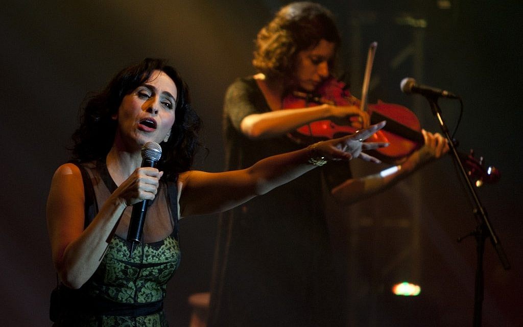 Rita, an Israeli singer of Iranian descent, performs in Ashdod in June 2012 (photo credit: AP Photo/Ariel Schalit) Rita, an Israeli singer of Iranian descent, performs in Ashdod in June 2012 (photo credit: AP Photo/Ariel Schalit)