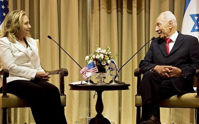 President Shimon Peres and US Secretary of State Hillary Clinton meet at the president's residence in Jerusalem on July 16, 2012. (photo credit: AP/Brendan Smialowski)