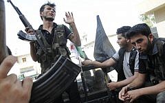 Syrian rebels in the city of Aleppo. (photo credit: AP/Alberto Prieto)