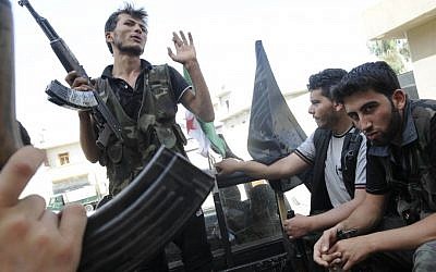 Syrian rebels in the city of Aleppo. (photo credit: AP/Alberto Prieto)