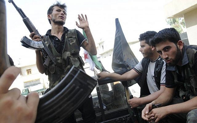 Syrian rebels in the city of Aleppo. (photo credit: AP/Alberto Prieto) Syrian rebels in the city of Aleppo. (photo credit: AP/Alberto Prieto)