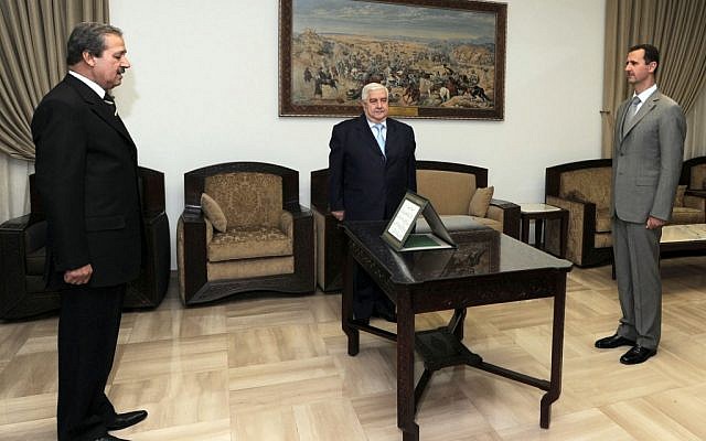 Syrian ambassador to Iraq Nawwaf Fares sworn in, 2008 (photo credit: AP Photo/SANA) Syrian ambassador to Iraq Nawwaf Fares sworn in, 2008 (photo credit: AP Photo/SANA)