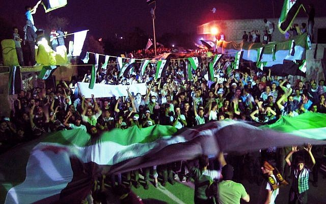 A Syrian opposition rally in Damascus on Sunday. (photo credit: AP/Kafarsouseh Revolt) A Syrian opposition rally in Damascus on Sunday. (photo credit: AP/Kafarsouseh Revolt)