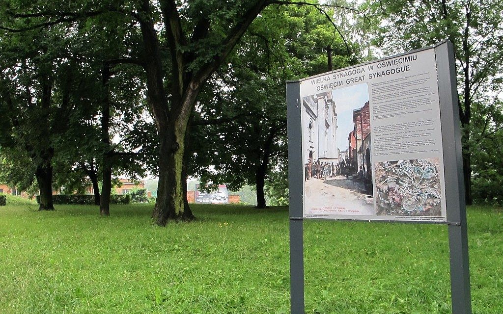 A sign denotes the empty space where the destroyed Great Synagogue in Oswiecim, the town in southern Poland where Auschwitz was built, once stood. (Ruth Ellen Gruber)