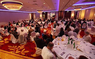 Dozens of elderly Poles who helped save Jews during World War II were celebrated and praised for their heroism at a lunch in Warsaw, Poland, on Sunday July 15 (photo credit: AP/Czarek Sokolowski)
