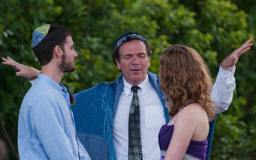 Illustrative: Rabbi Lev Baesh, center, marrying Jared and Laurie Berezin, an interfaith couple from Boston, Aug.19, 2011. (photo credit: courtesy, Jared and Laurie Berezin) Illustrative: Rabbi Lev Baesh, center, marrying Jared and Laurie Berezin, an interfaith couple from Boston, Aug.19, 2011. (photo credit: courtesy, Jared and Laurie Berezin)