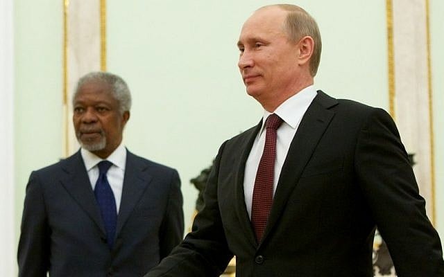 Russian President Vladimir Putin walks as United Nations special envoy Kofi Annan looks on before their talks in Moscow, Tuesday, July 17, 2012. (photo credit: Alexander Zemlianichenko/AP)