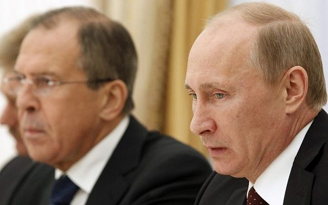Russian President Vladimir Putin, right, and Foreign Minister Sergey Lavrov (photo credit: Sergei Karpukhin/AP)