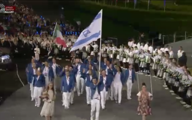 The Israeli national team marching in the Olympic Opening Ceremony Friday night. (photo credit: Image capture from Channel 1) The Israeli national team marching in the Olympic Opening Ceremony Friday night. (photo credit: Image capture from Channel 1)