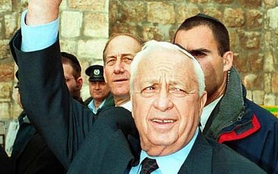 Newly-elected Israeli Prime Minister Ariel Sharon (with then-Jerusalem Mayor Ehud Olmert behind him) visiting the Western Wall the morning following his victory over Ehud Barak. (photo credit: Nati Shohat/Flash 90)