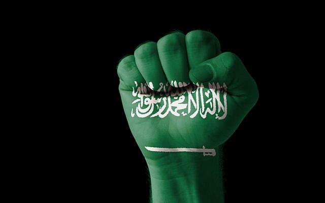 (Saudi flag fist via Shutterstock)