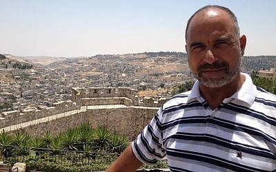 Abdullah Jarjawi, a primary school principal from Segev Shalom has been accompanying the group for eight years (photo credit: Elhanan Miller/Times of Israel) 