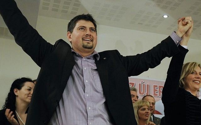 Csanad Szegedi celebrating his entry into the European Parliament after the European parliamentary election in Budapest, Hungary in 2009. (photo credit: AP Photo/Bela Szandelszky, File) Csanad Szegedi celebrating his entry into the European Parliament after the European parliamentary election in Budapest, Hungary in 2009. (photo credit: AP Photo/Bela Szandelszky, File)