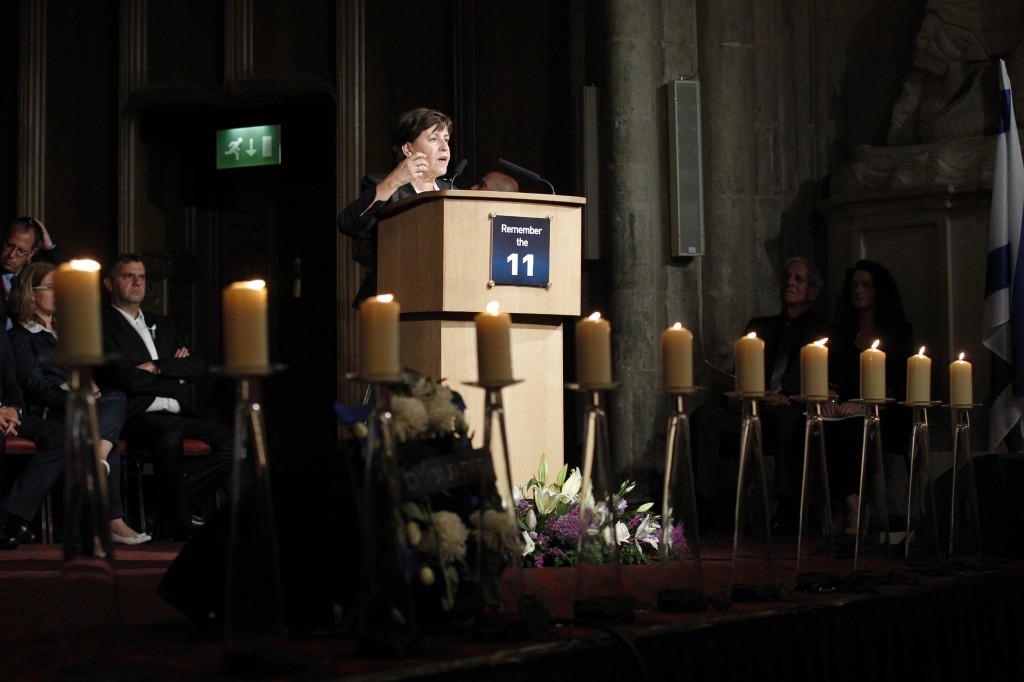 Ankie Spitzer, widow of one of the 11 members of the Israeli team who were killed in the terrorist attack at the 1972 Munich Olympic Games, addresses guests at a memorial ceremony at Guildhall in London on Monday, Aug. 6, 2012. (photo credit: Sang Tan/AP) Ankie Spitzer, widow of one of the 11 members of the Israeli team who were killed in the terrorist attack at the 1972 Munich Olympic Games, addresses guests at a memorial ceremony at Guildhall in London on Monday, Aug. 6, 2012. (photo credit: Sang Tan/AP)