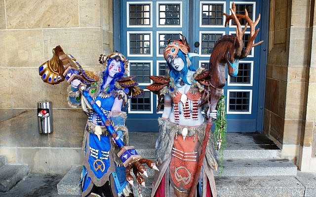 Illustrative photo of costumed World of Warcraft players dressed as night elf druids (photo credit: CC BY-SA, Elvis untot, Wikimedia Commons) Illustrative photo of costumed World of Warcraft players dressed as night elf druids (photo credit: CC BY-SA, Elvis untot, Wikimedia Commons)