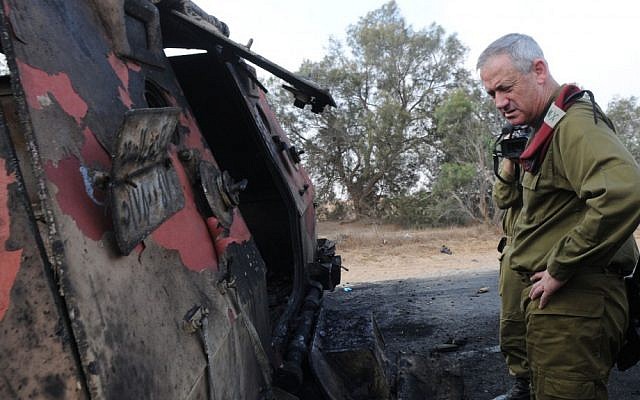 Benny Gantz inspects a burnt out personnel carrier after the August 5 attack on the Israel-Egypt border. (photo credit: IDF Spokesman's Unit) Benny Gantz inspects a burnt out personnel carrier after the August 5 attack on the Israel-Egypt border. (photo credit: IDF Spokesman's Unit)