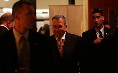 Ehud Barak -- defense minister and former prime minister -- surrounded by security guards (photo credit: Kobi Gideon/Flash90)