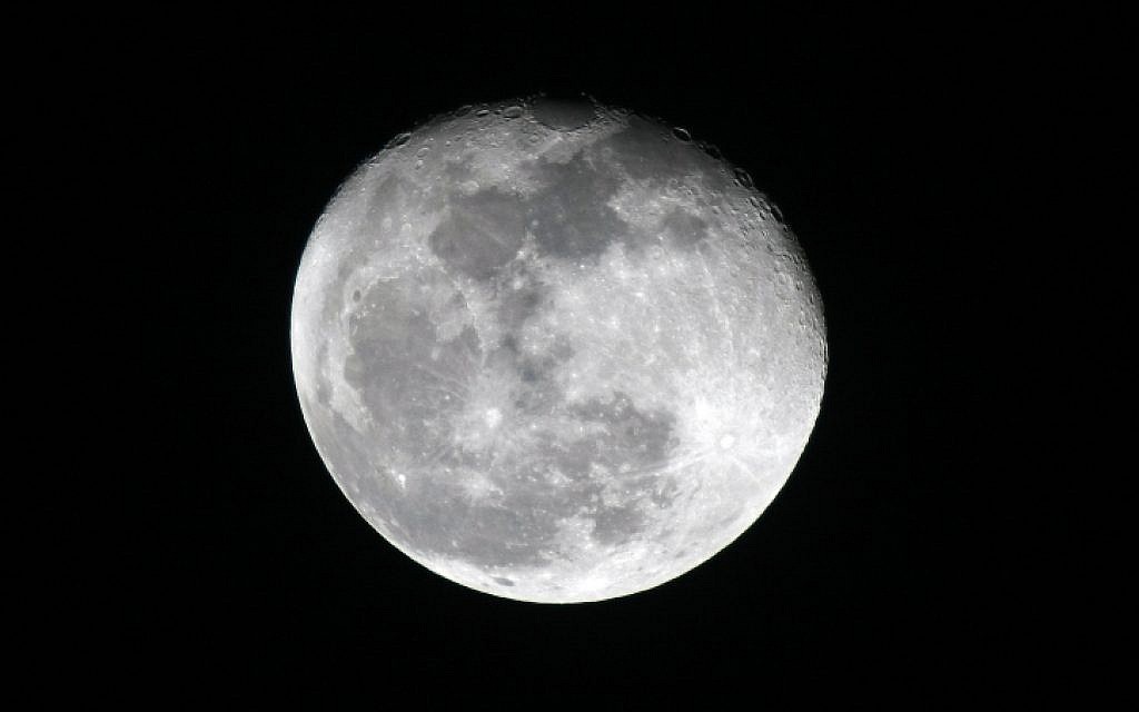 Was her bashert gazing at the same moon? (photo credit: Abir Sultan/Flash90)