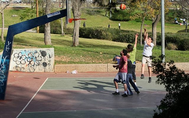 Boys playing basketball in Jerusalem (Illustrative photo: Kobi Gideon/Flash90)