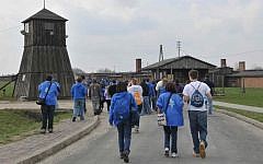 Visitors walk the grounds of Majdanek, where more than 75,000 prisoners were murdered during the Holocaust (Photo credit: Yossi Zeliger/Flash90)