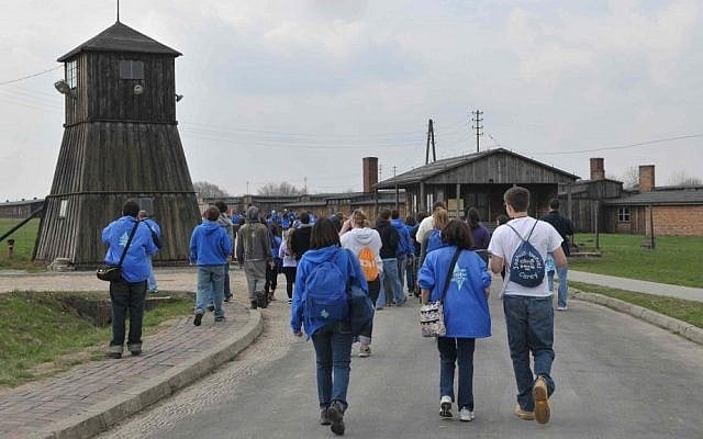Visitors walk the grounds of Majdanek, where more than 75,000 prisoners were murdered during the Holocaust (Photo credit: Yossi Zeliger/Flash90) Visitors walk the grounds of Majdanek, where more than 75,000 prisoners were murdered during the Holocaust (Photo credit: Yossi Zeliger/Flash90)