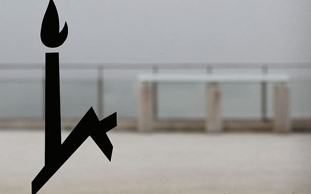 The logo of the Hebrew University of Jerusalem is glued to a door on the Mount Scopus campus. (Nati Shohat/Flash90)
