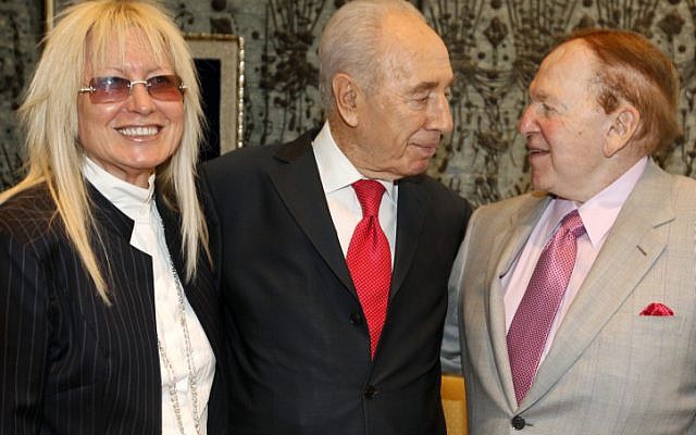 President Shimon Peres with Jewish billionaire businessman Sheldon Adelson (right) and his wife Miriam Ochshorn at the President's house on August 17, 2011. (photo credit: Miriam Alster/Flash90)