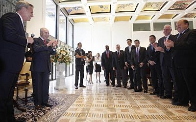 A Congressional delegation singing happy birthday to president Shimon Peres. (photo credit: Miriam Alster/Flash90)