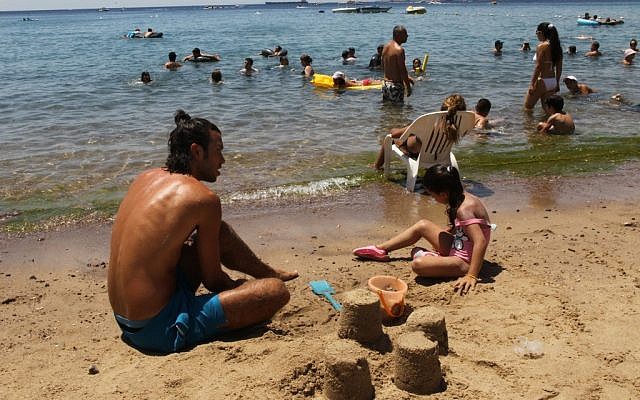 Cooling off at the beach in Eilat. (photo credit: Nati Shohat/Flash90)