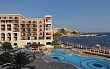 Illustrative image of a hotel pool,  on the shoreline of Valletta, the capital of Malta, in the Mediterranean Sea (photo credit: Nati Shohat/Flash90)