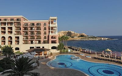 Illustrative image of a hotel pool,  on the shoreline of Valletta, the capital of Malta, in the Mediterranean Sea (photo credit: Nati Shohat/Flash90)